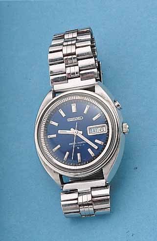 SEIKO ARMBANDWECKER BELMATIC, REF.-NR. 4006-7001, JAPAN UM 1970, EDELST., NEUTR. EDELST.-BAND, TAG U. DATUM, WECKBEREITSCHAFTS-DRüCKER ...