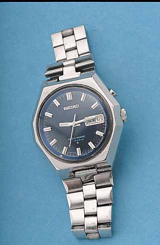 SEIKO ARMBANDWECKER BELMATIC, REF.-NR. 4006-7001, JAPAN UM 1970, EDELST., ORIG.- EDELST.-BAND, TAG U. DATUM, WECKBEREITSCHAFTS-DRüCKER ...