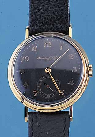 IWC ARMBANDUHRWERK, SCHWEIZ UM 1943, NEUTR. GG 750/000-RUNDGEH., BODEN U. GLASR. GEDR., BLATT REST., BRüCKENANKERW., KAL. 83, 15 ST., GEPR. ...