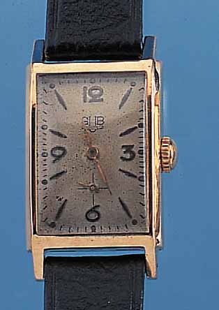 GUB HERRENARMBANDUHR RAUMNUTZWERK, REF.-NR. 18574, DEUTSCHLAND UM 1955, METALL ROSE NACH- VERG., EDELST.-BODEN GEDR., IN SICH L. GEW., ORIG.-BLATT, ...