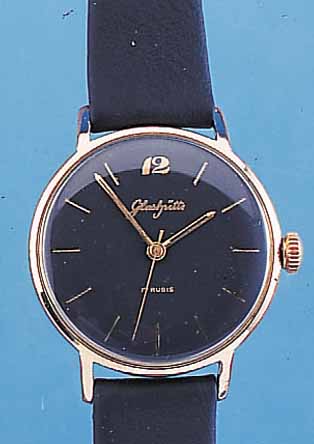 GUB HERRENARMBANDUHR, REF.-NR. 169620, DEUTSCHLAND UM 1965, METALL ROTVERG., EDELST.-BODEN GEDR., BER., LEDERB. NEU, BLATT REST., KAL. 70,1, ...