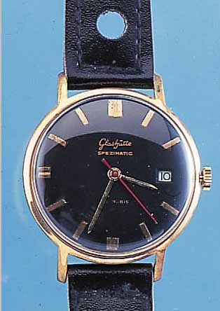GLASHÜTTE HERRENARMBANDUHR SPEZIMATIC, DEUTSCHLAND UM 1967, METALL GELB VERG., BER., EDELST.-BODEN GEDR., DATUM, BLATT REST., 26 ST., ...