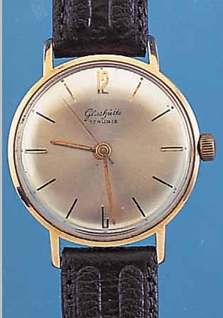 GLASHÜTTE HERRENARMBANDUHR, REF.-NR. 212848,DEUTSCHLAND UM 1964, METALL GELB VERG., EDEL- ST.-BODEN GEDR., BER., LEDERB. NEU, 17 ST., ...
