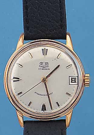 GUB HERRENARMBANDUHR, DEUTSCHLAND UM 1965, METALL VERG., EDELST.-BODEN GEDR., ZENTRAL- SEK., DATUM, 17 ST., ANKERRUNDW., HANDAUFZUG- KAL. 69,1, ...
