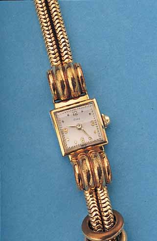 ESKA DAMENARMBANDUHR, SCHWEIZ UM 1949, METALL M. GG-AUFLAGE, AUSGEF., SELTENES SCHLANGENGLIEDERB., 2-REIHIG, ZEITIDENT., KONKAVGL., ...