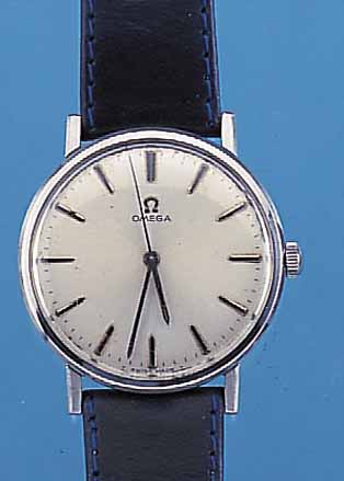 OMEGA HERRENARMBANDUHR, REF.-NR. 131/019, SCHWEIZ UM 1964, EDELST., BODEN U. GLASR. GEDR., BLATT VERS., ZUM RAND L. FL., RUNDAN- KERW., ROT ...