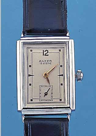 ANKER HERRENARMBANDUHR, DEUTSCHLAND UM 1955, METALLGEH. HARTVERCHR., AUF KUNDENWUNSCHWOHL NACHTR. BEIDS. VERGL., FORMANKERW., 15 ST., ...