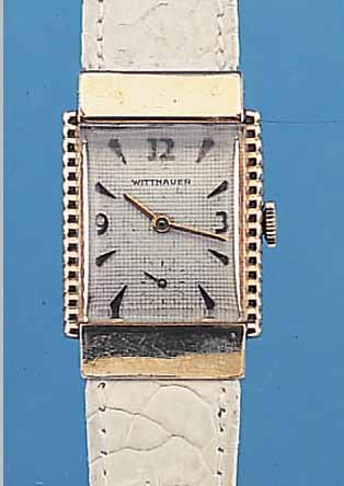 WITTNAUER HERRENARMBANDUHR, REF.-NR. 512746, SCHWEIZ/USA UM 1950, METALL-RECT.-GEH. HART- VERG., EDELST.-BODEN GEDR., KONKAVGL., ORIG.- BL. ...
