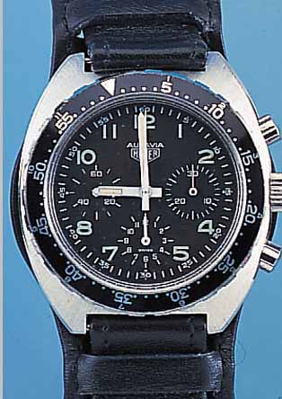 HEUER LEONIDAS ARMBANDCHRONOGRAPH AUTAVIA, SCHWEIZ UM 1988, EDELST., BODEN GESCHR., MILI-TäRLOOK, LüNETTE M. 60ER TEILUNG, BEIDS. RAST.DREHB., ...