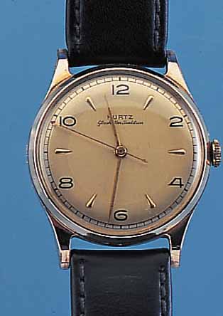 KURTZ HERRENARMBANDUHR GLASHüTTER TRADITION, DEUTSCHLAND UM 1950, METALL M. RG-AUFLAGE, EDELST.-BODEN U. GLASR. GEDR., AUßER KRONE U. LEDERB. ...