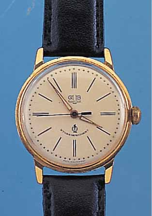 GUB HERRENARMBANDUHR, REF.-NR. 124326, DEUTSCHLAND UM 1957, METALL VERG., EDELST.- BODEN GEDR., SOGEN. GüTEUHR, INCABL. STOSS- GES., ...