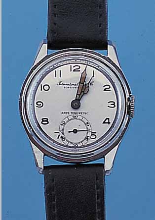 IWC HERRENARMBANDUHR, REF.-NR. 989186, SCHWEIZ UM 1938, EDELST., BODEN U. GLASR. GEDR., BLATT REST., BRüCKENANKERW., 15 ST., ...