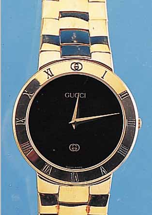 GUCCI HERRENARMBANDUHR, REF.-NR. 330M, SCHWEIZ UM 1994, METALL HARTVERG. INCL. ME- TALLBAND, MINERALFLACHGL., STD.-ZEICHEN AUF LüNETTE, ...