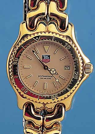 HEUER/TAG HERRENARMBANDUHR PROFESSIONAL, REF.-NR. S94-006, SCHWEIZ UM 1995, METALL HARTVERG. INCL. EDELST.-BAND M. SICHERHEITS- FALTSCHL., ...