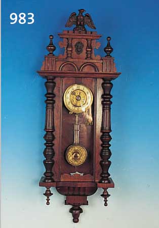 WANDUHR, MARKE PFEILKREUZ, UM 1900, VERZIER-TES HOLZGEHäUSE, ORIGINAL-AUFSATZ, ADLERBE- KRöNUNG, DREISEITIG VERGLAST, PAPIERZIFFERN- RING, ...