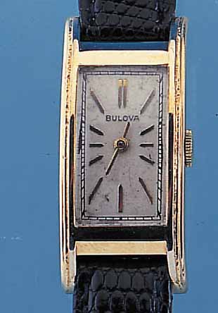 BULOVA HERRENARMBANDUHR, REF.-NR. 7030381, SCHWEIZ/USA UM 1938, GG-FILLED, RECT.-FORM, GEZ., LüNETTE SEITL. SCHMUCKGEPR., BODEN GE- DR., IN ...