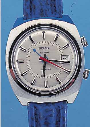 PROVITA ARMBANDWECKER, SCHWEIZ UM 1972, EDELST., CARREE-CAMBRE, BODEN GESCHR., BEI FERTIGST. WASSERGESCH., VERS. BLATT M. EXTREM ERH. ...