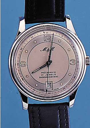 M & M HERRENARMBANDUHR MECHANIC, SCHWEIZ, METALL VERCHR., BEIDS. VERGL., 2-FARB. VERS. BLATT, 17 ST., HANDAUFZUGKAL. VON FHF, INCABL.STOßGES., ...