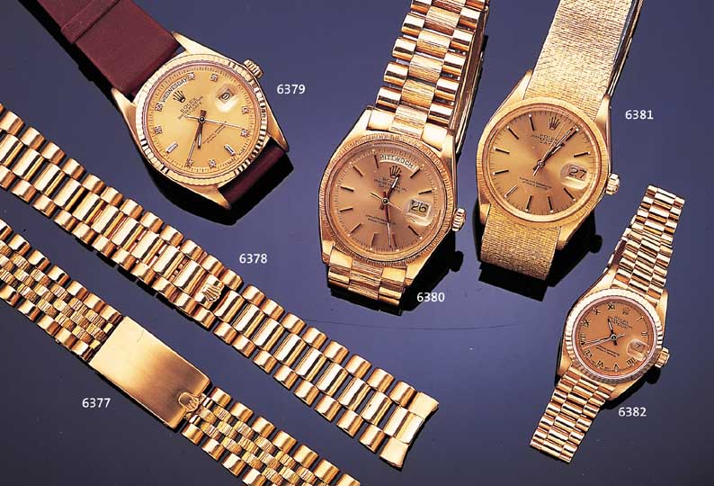 ROLEX HERRENARMBANDUHR DAY DATE, REF.-NR. 1803, SCHWEIZ UM 1977, GG 750/000-MASSIVGEH., BODEN U. KRONE GESCHR., BEI FERTIGST. WASSER- D., OFFICALY ...