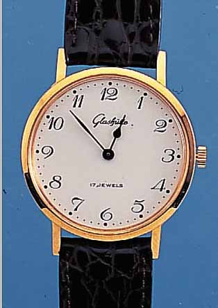GLASHÜTTE HERRENARMBANDUHR, UNGETR. LAGERW.,UM 1985, LEDERB. NEU, METALL HARTVERG., EDEL- ST.-BODEN GEDR., EMAILFARB. ...