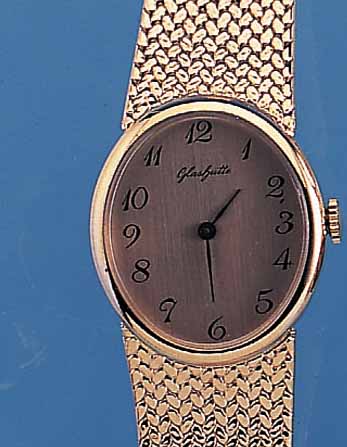 GLASHÜTTE HERRENARMBANDUHR, UNGETR. LAGERW.,UM 1985, METALLGEH. HARTVERG. INCL. BAND,EDEL-ST.-BODEN GEDR., EMAILFARB. ...