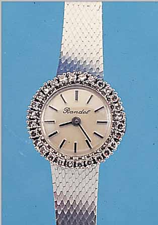 BANDEL DAMENSCHMUCKUHR, SCHWEIZ/DEUTSCHLAND UM 1968, WG 585/000 RODH., INCL. MILANAISE- BAND, LUENETTE M. BRILLANTBES., BODEN GEDR., ETA KAL. ...