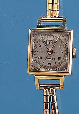 MOVADO DAMENARMBANDUHR DAY DATE, REF.-NR. 3025, SCHWEIZ UM 1940, GG 750/000, GG-KORDEL- BAND, NEUTR. SPAETER, BODEN GEDR., BLATT VERS., FL., ...