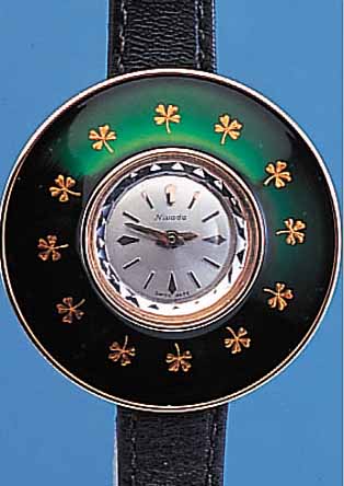 NIVADA DAMENARMBANDUHR, SCHWEIZ UM 1962, DESIGN VERäNDERB. DURCH WECHSELLüNETTEN, 1X ALS ANHäNGEUHR, AUßENTEILE DES GEH. VERG., ...