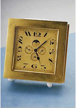 CONCORD WATCH CO. TISCHUHR MIT EINGEBAUTEM TASCHENUHRWERK FüR GUBELIN, LUZERN, WERK- NR. 2309256, VOLLKALENDERANZ. INCL. MONDPHASE,HANDGEARB. ...