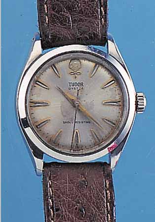TUDOR HERRENARMBANDUHR OYSTER, REF.-NR. 7934, SCHWEIZ UM 1963, EDELST., BODEN U. KRONE GESCHR., SYSTEM ROLEX, AB HERST. WASSERD., ORIG.-BLATT ...