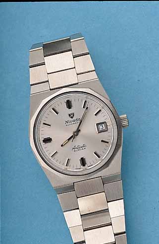 NIVADA HERRENARMBANDUHR ANTARCTIC-GLACIER, SCHWEIZ UM 1975, EDELSTAHL, EDELST.-BAND, ETA-BASISKAL. 2782, INCABL., UNGETR. LAGERWARE, L. LAGERSP., ...