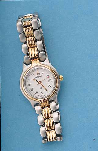 ATLANTIC DAMENARMBANDUHR, REF.-NR. 6605, SCHWEIZ UM 1995, EDELSTAHL, EDELST.-BAND, MATT., LüN., KRONE, SOWIE ZWISCHENGL. ...