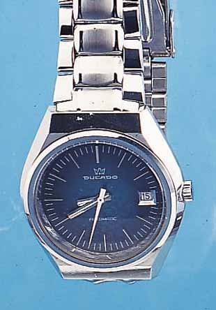KONVOLUT: 2 DUCATO HERRENARMBANDUHREN, BEIDEAUTOMATIK, 1X EDELST. POL. INCL. EDELST.-BAND,MINERALFLACHGL., UNGETR. LAGERW., UM 1972, BASISKAL. ...
