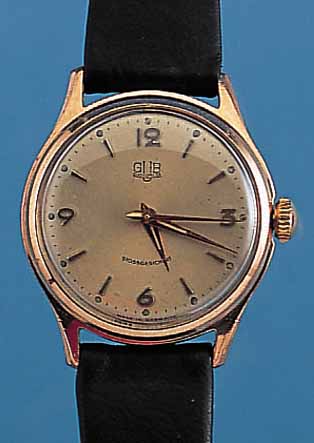 GUB HERRENARMBANDUHR, REF.-NR. 206162, DEUTSCHLAND UM 1958, METALL ROTVERG., EDELST.-SCHR.-BODEN, GUILL. U. VERS. BLATT, 16 ST., RINGUNR., ...