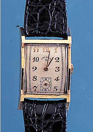 LORD ELGIN HERRENARMBANDUHR, REF.-NR. 4617, USA UM 1950, GG-FILLED, RECT.-FORM, BODEN GEDR., IN SICH GEW., FORMANKERW., 21 ST., ...
