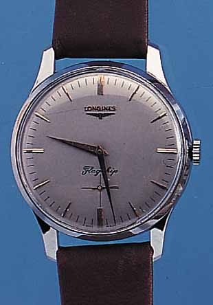 LONGINES ARMBANDUHRWERK, SCHWEIZ UM 1956, NEUTR. METALLGEH. VERCHR., BLATT REST., FLAG- SHIPBEZ. IST FEHLDRUCK, 17 ST., RUNDANKERW., ...