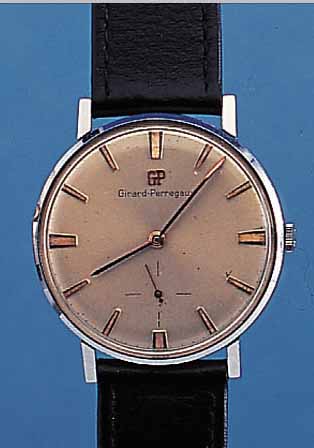 GIRARD PERREGAUX HERRENARMBANDUHR, REF.-NR. 8725A, SCHWEIZ UM 1963, METALL VERCHR., EDEL- ST.-BODEN U. GLASR. GEDR., BLATT VERS., L. FL.RUNDANKERW., ...