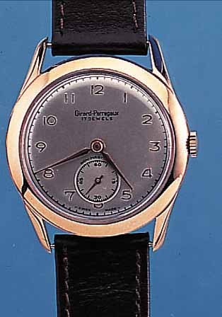 GIRARD PERREGAUX HERRENARMBANDUHR, SCHWEIZ UM 1949, NEUTR. METALLGEH. ROTVERG., BODEN U. GLASR. GEDR., BLATT REST., 15 ST., HANDAUFZUG,GEPR. ...