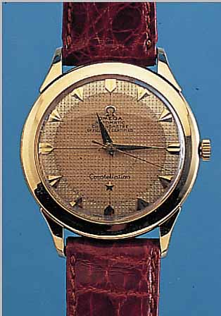 OMEGA HERRENARMBANDUHR CONSTELLATION CHRONO- METER, SCHWEIZ UM 1951, GG 750/000, BODEN WURDE NEUTR. ERS. (STERNWARTENSYMB. NACHTR. AUFGEL.), ...