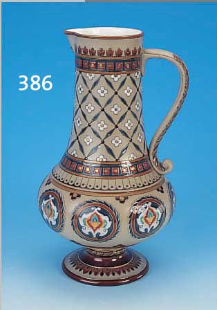 HENKELKRUG, METTLACH, UM 1889, STEINGUT, RELIEF. FLORALER DEKOR, BUNT STAFFIERT, GOLD- STAFFAGE, H. 36 CM
