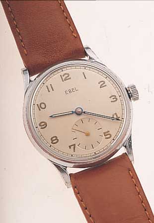 EBEL HERRENARMBANDUHR, REF.-NR. 248, SCHWEIZUM 1947, METALL HARTVERCHR., EDELST.-BODEN U. GLASR. GEDR., LEDERB., 15 ST., RUNDANKERW., KAL. 120, ...