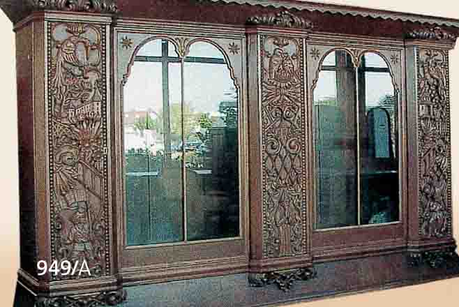 SCHREIBTISCH, U. BüCHERSCHRANK, DEUTSCH, 30ER J., EICHE Z. T. MASS. U. -FURNIER, MIT REICHEN AUFGELEGTEN SCHNITZEREIEN AUF DEN TüREN, ...