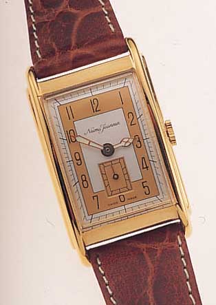 NUMA JEANNIN HERRENARMBANDUHR, REF.-NR. 3688, SCHWEIZ UM 1996, METALL HARTVERG., EDELST.-BODEN GEDR., IN SICH GEW., 2-FARB. BLATT, ...