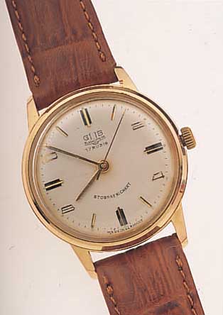 GUB HERRENARMBANDUHR, REF.-NR. 275144, DEUTSCHLAND UM 1968, METALL ROSEVERG., BODEN EDELST. GEDR., 17 ST., HANDAUFZUGKAL. 70,1, RINGUNR., ...