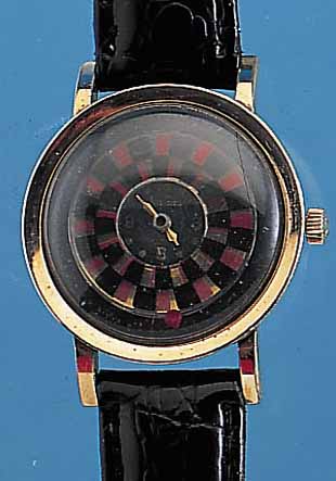 NIVADA HERRENARMBANDUHR COCKTAILS WATCH, SCHWEIZ/USA UM 1956, METALL M. GG-AUFLAGE, EDELST.-BODEN GEDR., MYSTERIEUSE ANZEIGE DURCHROTIERENDE ...