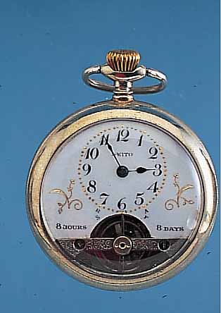 SWITO/HEBDOMAS HERRENTASCHENUHR 8-TAGE, NICKEL, SCHWEIZ UM 1920, EMAILBL. M. GOLD- PIQUETARB., FEIN HAARR., SCHWUNGBER. DER UNR. SICHTB., GR. ...