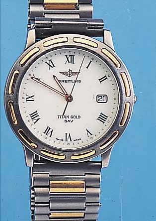 BREITLING HERRENARMBANDUHR TITAN/GOLD, REF.-NR. 8670/2655, SCHWEIZ UM 1990, TITAN, BODEN GEDR., ZWISCHENGL., SOWIE TEILE DER LüNETTE ...