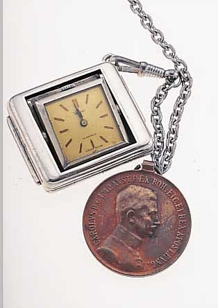 WYLER TASCHEN/REISEüHRCHEN, M. PATENTIER- TEM SPRUNGDECKELEFFEKT, METALL VERN., NICKEL- KETTE M. KUPFERMEDAILLE SEK., RUNDANKERW., 15 ST. IN ...