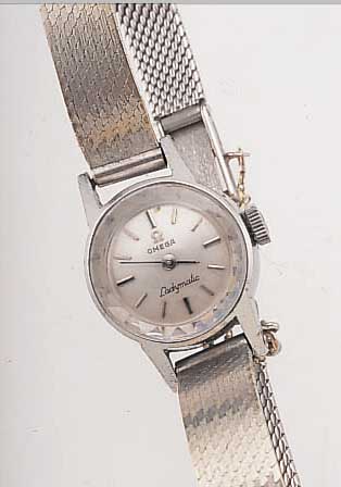 OMEGA DAMENGOLDBANDUHR LADYMATIC, REF.-NR. 551004, SCHWEIZ UM 1965, EDELST., NEUTR. WG 585/000-GLIEDERB., BODEN GEDR., VERS. BLATT, BOMB. ...