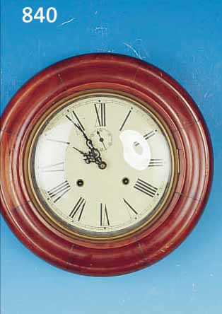 WANDUHR, AMERIKA, UM 1910, RUNDER PROFIL- LIERTER HOLZRAHMEN, GLASDECKEL, SKEL. MESSING-PLATINENWERK, SOG. AMERIKANERWERK, INT. ...